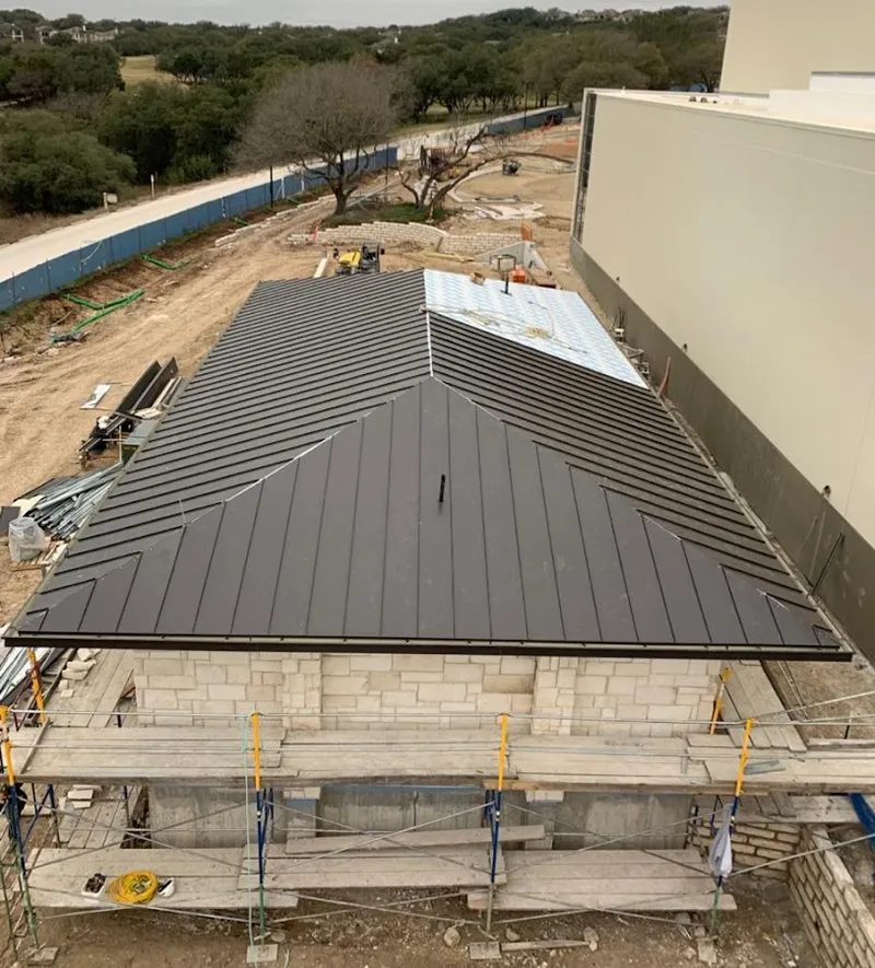 Metal roof new construction with scaffolding in Lutz